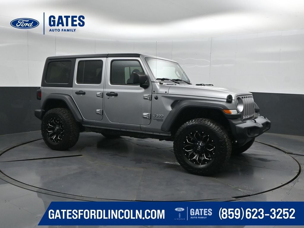 2018 Jeep Wrangler Unlimited Sport in Billet Silver Metallic Clearcoat — front three-quarter view