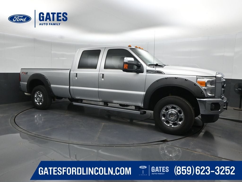 2012 Ford F-250SD Lariat in Ingot Silver — front three-quarter view