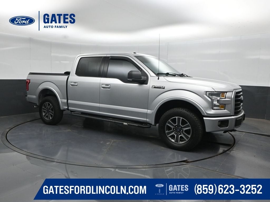 2015 Ford F-150 XLT in Ingot Silver — front three-quarter view