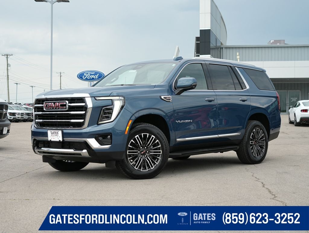2026 GMC Yukon Elevation in Downpour Metallic — front three-quarter view