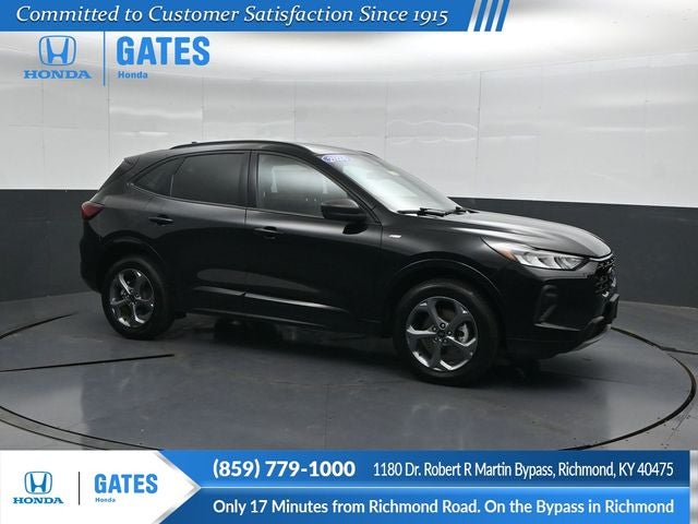 2024 Ford Escape ST-Line in Black Metallic — front three-quarter view