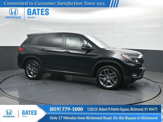2023 Honda Passport EX-L in Crystal Black Pearl — front three-quarter view