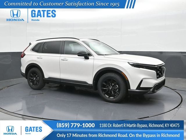 2025 Honda CR-V Hybrid Sport-L in Platinum White Pearl — front three-quarter view