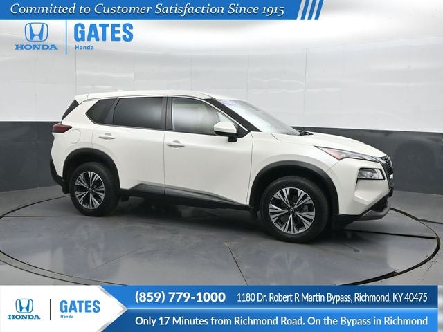 2023 Nissan Rogue SV in Pearl White Tricoat — front three-quarter view