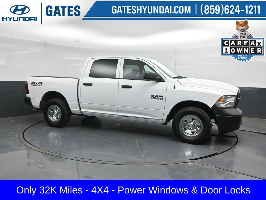 2016 RAM 1500 Tradesman in Bright White Clearcoat — front three-quarter view