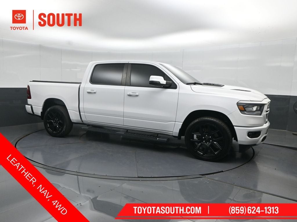2023 RAM 1500 Laramie in Bright White Clearcoat — front three-quarter view