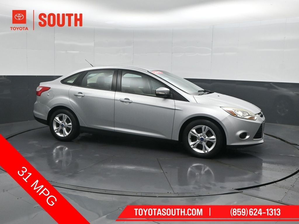 2013 Ford Focus SE in Ingot Silver — front three-quarter view