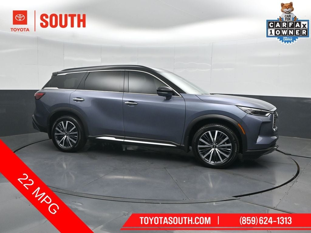 2023 INFINITI QX60 Autograph in Moonbow Blue/Black Obsidian — front three-quarter view