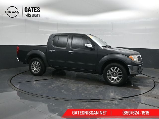 2013 Nissan Frontier SL in Night Armor — front three-quarter view