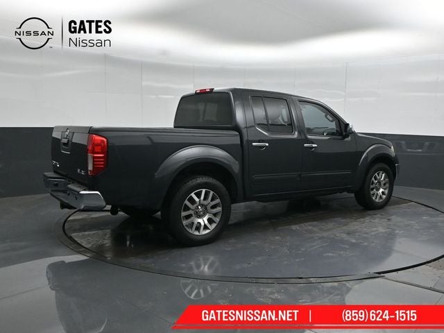 2013 Nissan Frontier — side profile view