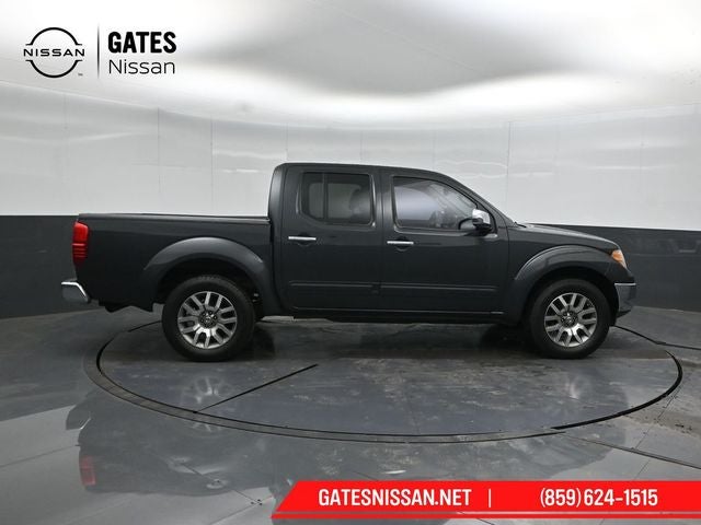 2013 Nissan Frontier — rear three-quarter view