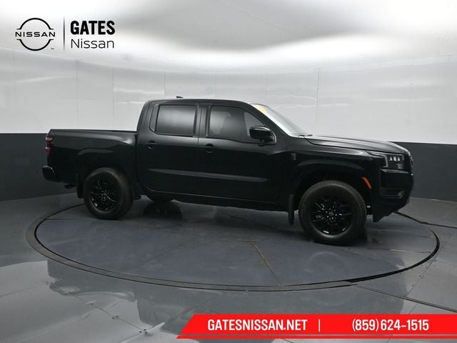 2026 Nissan Frontier SV in Super Black — front three-quarter view