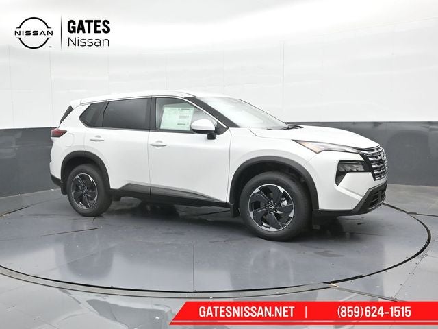 2026 Nissan Rogue SV in Everest White Pearl Tricoat — front three-quarter view