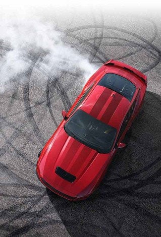 Overhead view of a 2024 Ford Mustang® model with tire tracks on pavement | Gates Ford Lincoln in Richmond KY
