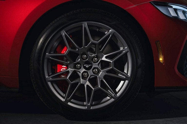 2024 Ford Mustang® model with a close-up of a wheel and brake caliper | Gates Ford Lincoln in Richmond KY